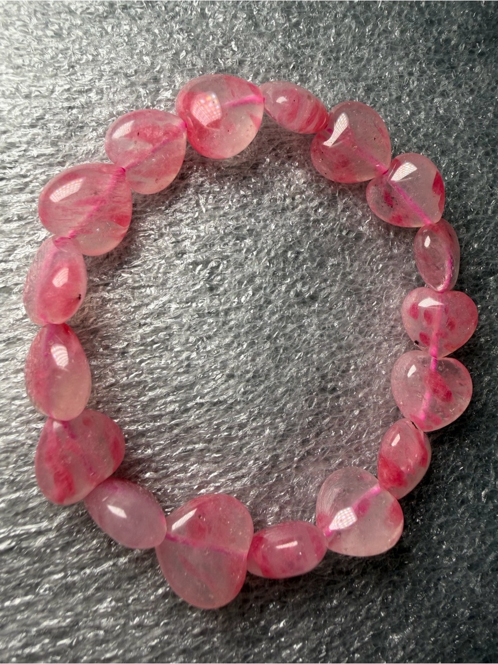 Show-Stopping 12MM Icy Rhodonite Heart Shaped Natural Crystal Bracelet